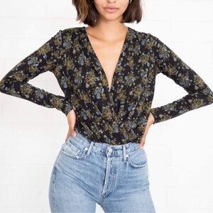 Intemately Free People Turnt Printed Bodysuit - Black
Combo S Floral